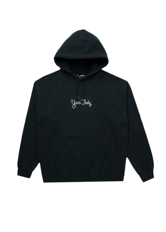 Black Ariana Grande hoodie with 'Yours Truly' embroidered in white cursive text on the chest. Simple and classic design inspired by her debut album aesthetic.